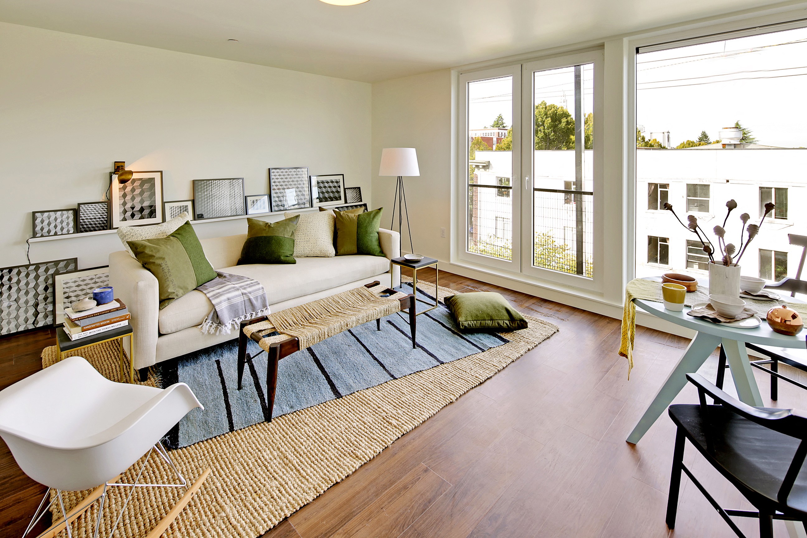 a living room with a white couch and a rug  at 19th & Mercer, Seattle, Washington